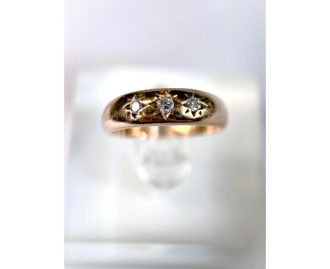An Edwardian 9 ct rose gold gypsy ring set with 3 diamonds, 4.5gm, size N 