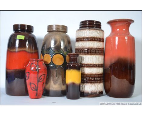 A set of 6 West German fat lava vases, to include 2 smaller and one that has been partially converted to a lamp base. Measure