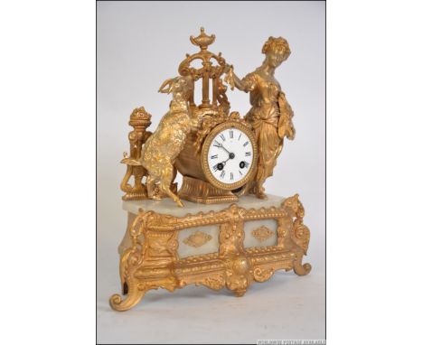 A 19th century alabaster and gilt metal French mantel clock by Vincent et Cie. The case with classical maiden and goat, the 8