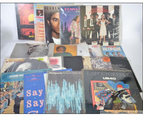 A collection of vinyl long play albums to include Bob Marley, Michael Jackson, The Stranglers, UB40 and others