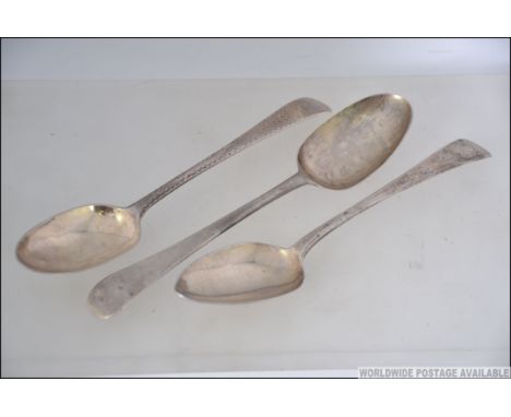 3 18th century Georgian silver hallmarked table spoons to include possibly John Lambe, the other marked IB possibly James Bea