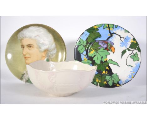 A Belleek fruit bowl having white glaze being stamped to underside together with an Art Deco Royal Doulton cabinet plate and 