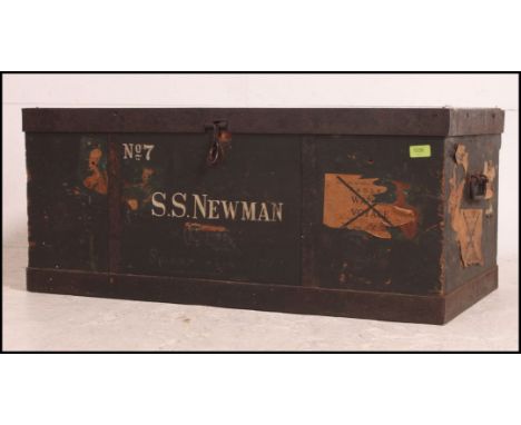 An excellent large 20th century steamer trunk with many original travel stickers and labels. Measure: 40cms high x 93cms wide