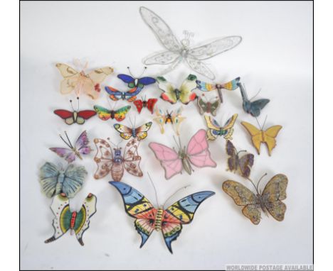 A large decent collection of decorative butterflies , to include ceramic ,  stained glass , and wirework examples
