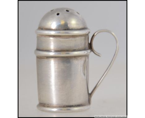 A silver hallmarked miniature thimble by S. Blanckensee & Son Ltd bearing Birmingham hallmarks for Birmingham 1900. Weight 4.