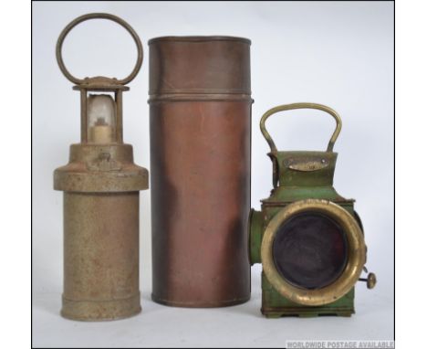 A small collection of items to include a vintage miners / warning lamp along with a vintage vehicle  lamp along with a brass 