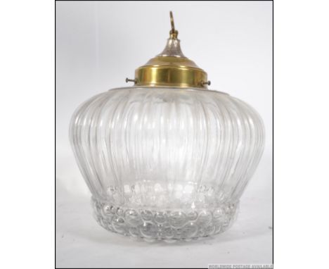 1950's / 60's glass lamp shade with bubble effect underside based on the shape of a traditional crown , with brass fittings. 