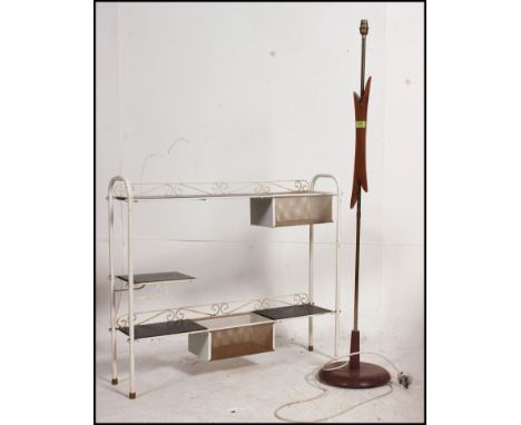 A retro 1960's teak wood standard lamp together with a metal plant stand, the mesh stand with black glass insets. Plant stand