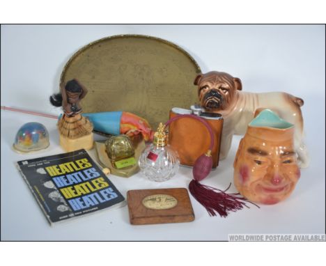 A fantastic dealers lot consisting of a Melba ceramic Bulldog, a brass bulldog wall plaque, a Fieldings toby jug, an early 20