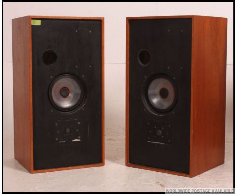 A pair of stunning retro Harbeth Monitor speakers in Teak finish, each speaker bearing label to the rear with sequential seri