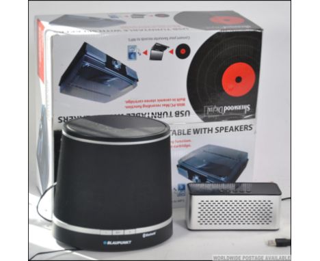 A boxed digital USB vinyl record player along along with a set of wireless Blau