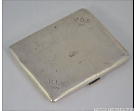 A silver hallmarked cigarette case  with monograms and dates for JDS 1906 - KLS 1920. Hallmarks for Stokes & Ireland Ltd -Wil