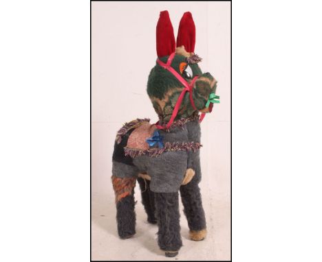 A retro vintage 1970's patchwork donkey . A stalwart of the 70's Benidorm holiday scene , probably last seen hanging out in a