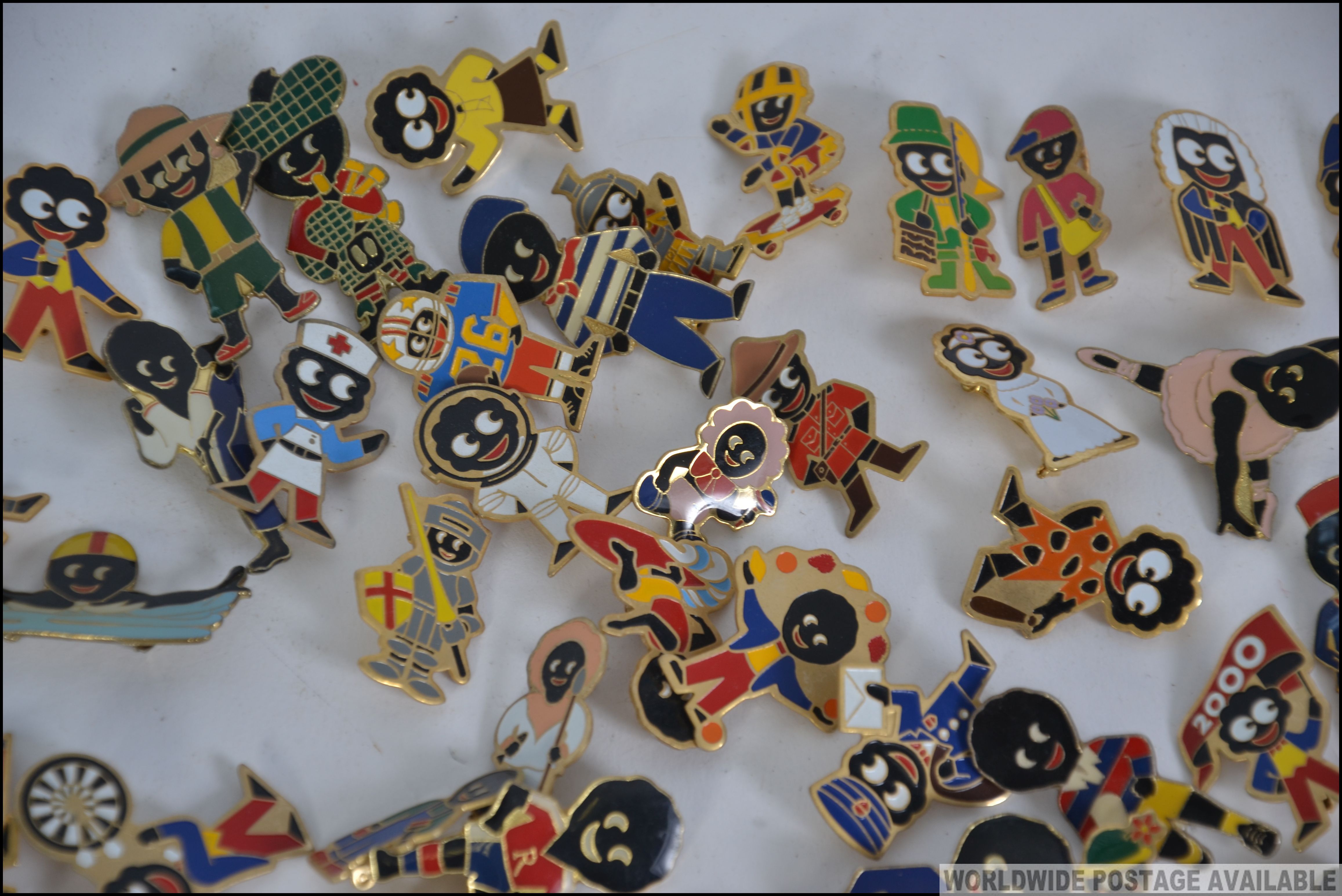 An excellent collection of enamel badges Robertsons gollies