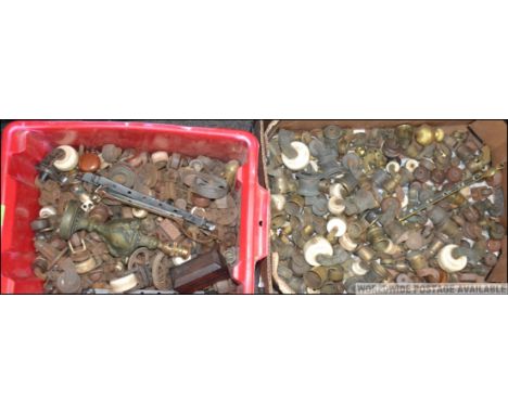 2 boxes of furniture fittings to include castors from the 18th / 19th and 20th century. Brass, ceramic and brass etc