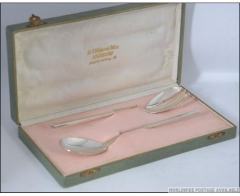 A 1950's cased silver 800 marked pair of salad servers by Wilkens & Soehne, Bremen, Germany complete in the original presenta