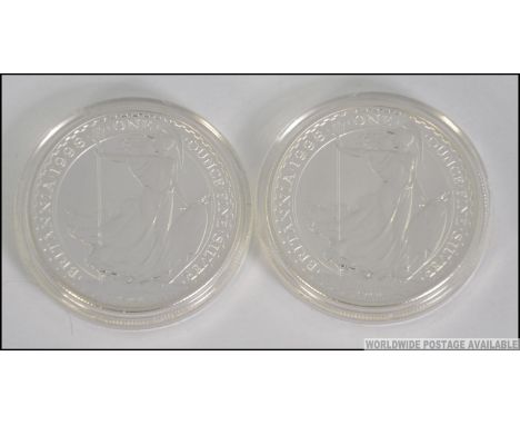 2 silver £2 proof coins in the cases, both one ounce fine silver, the obv marked for Nathan