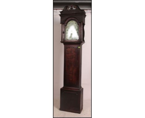A 19th century West Country oak longcase grandfather clock by JN Chance of Chepstow. The painted face with subsiduary dial in