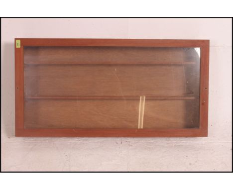 A 20th century scratch built display cabinet, having a shelved interior with a glazed drop down viewing panel