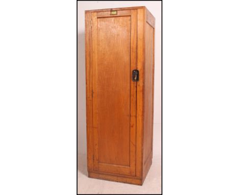 An early 20th century Air Ministry type locker with full length door being constructed on panel wood having good latch. Belie