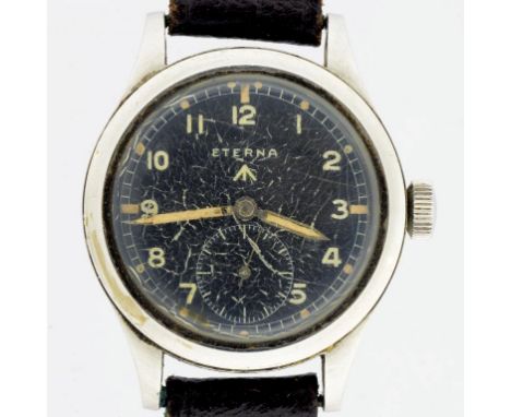AN ETERNA STAINLESS STEEL BRITISH MILITARY ISSUE WRISTWATCH, CASE BACK MARKED BROAD ARROW WWW P1492 AND ANOTHER NUMBER 