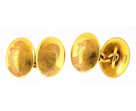 A PAIR OF GOLD CUFF LINKS ENGRAVED WITH THE HEAD OF A BOY OR GIRL IN HAT OR BONNET, MARKED 18CT, EARLY 20TH C, 18.7G 