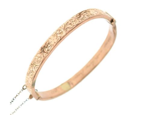 9ct gold snap bangle with engraved floral decoration, 7.7g approx