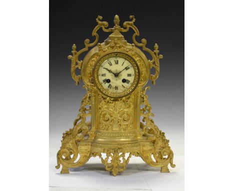 20th Century brass cased mantel clock, having Roman dial, 39cm high, with key 