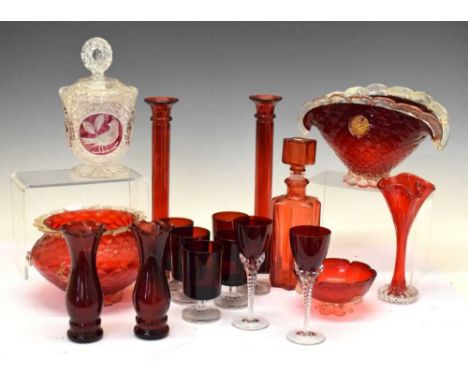 Quantity of vintage ruby-coloured glass, including three bowls decorated with aventurine inclusions, 28cm high and smaller