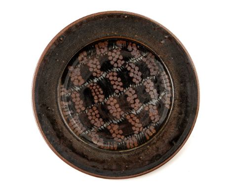 David Lloyd-Jones (1928-1994) large iron glazed charger, the centre of dish with painted decoration impressed seal marks  50c