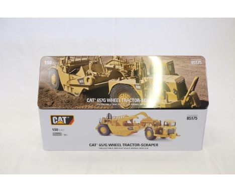 Diecast Masters  CAT 657G Wheel Tractor-Scraper  85175