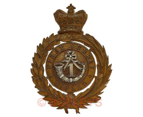 First Surrey Rifles Victorian Officer’s pre 1891 pouch belt plate.A good die-stamped gilt example. Crowned wreath, half of la
