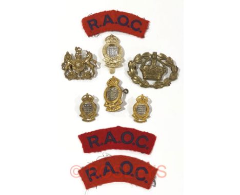 Royal Army Ordnance Corps King’s Crown anodised cap badge and others.A good rare RAOC anodised cap badge on turnback slider (
