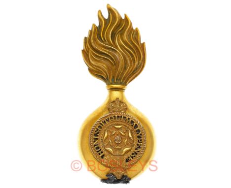 The Royal Fusiliers (City of London Regiment), Officer’s fur cap grenade circa 1901-14.A good gilt example.  Flaming grenade,