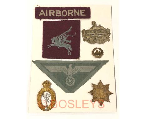 Selection of WW2 Airborne Cloth Badges etc.Comprising: “Airborne” (straight embroidered) cloth badge. .... Pegasus embroidere