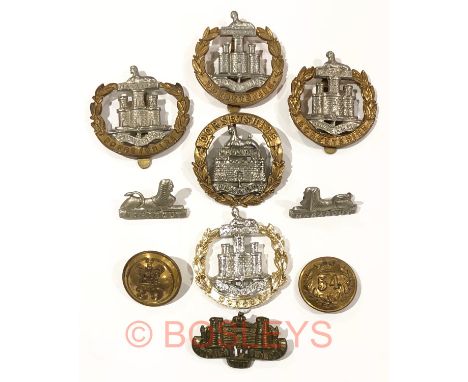 Dorset Regiment insignia.Cap badges : Victorian ... 2 x Dorsetshire ... wide Dorsetshire ... anodised by Gaunt. Pre 1881 coll