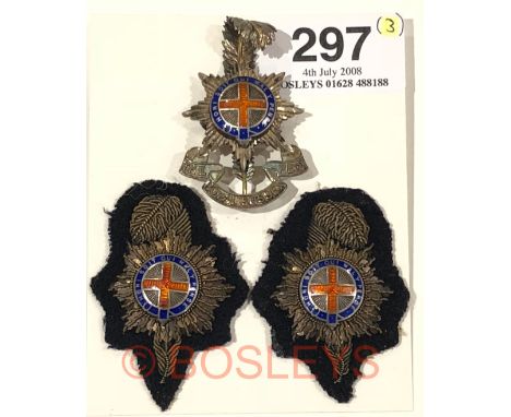 Royal Sussex Regiment Sterling Silver Officer’s cap badge and pair of bullion collars.A fine silver example on loops by JR Ga