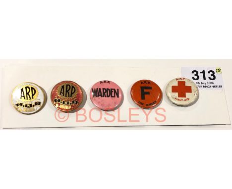 WW2 Home Front Co-operative Whole Sale Company ARP Badges etc.To good CWS ARP badges in white and red enamel. .... Accompanie