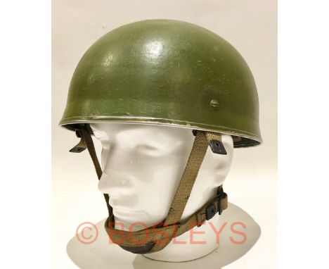 WW2 1943 Airborne Forces steel helmet with leather harness.A scarce example by Briggs Motor Bodies, Ltd (Dagenham), the skull