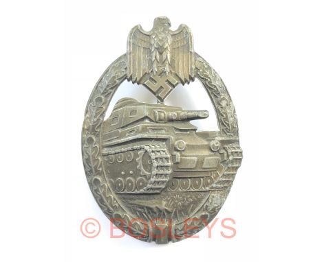 German Third Reich WW2 Army / Waffen SS Tank Assault Badge.A good die-cast grey example. Approaching panzer within an oval oa