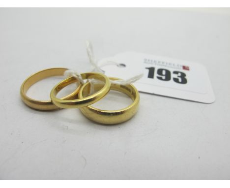 Two 18ct Gold Plain Wedding Bands, and another stamped "750" (finger sizes K, L. S) (total weight 11 grams).