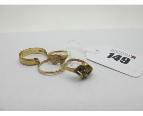 A 9ct Gold Heart Shape Signet Ring, (finger size K), a 9ct gold knot style ring (finger size J), a 9ct gold narrow wedding ba