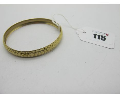 An Allover Textured Star Cut Bangle, "375" (8 grams)