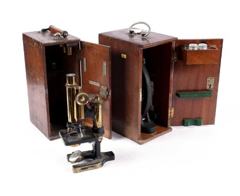 W. Watson &amp; Sons Ltd, London: "Praxis" brass monocular microscope, in carry case; and a minocular microscope by Cooke Tro