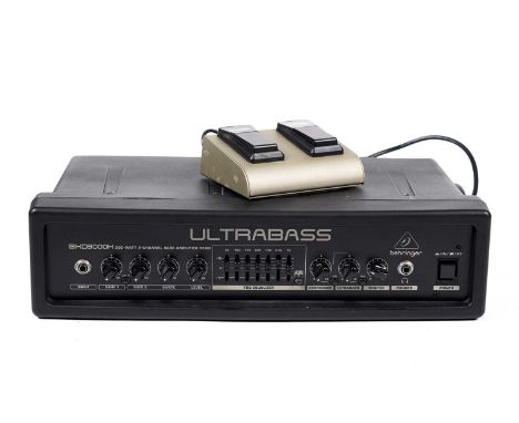A Behringer BXD3000H Ultrabass bass amplifier, with footswitch.