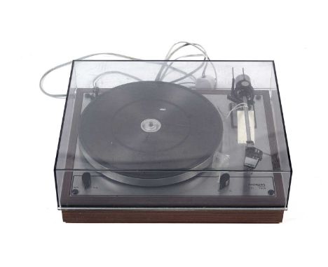 A Thorens TD165 record deck serial no. 029975, with Thorens tone arm fitted an Ortofon FF15E cartridge, on simulated walnut p