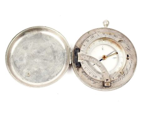 A late 19th Century equinoctial sundial compass, probably English for the French market, the central compass with locking mec