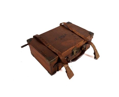 An early 20th Century Armstrong &amp; Co, Newcastle, ammunition case, brown leather with inscription to top 'T.Bell', with se