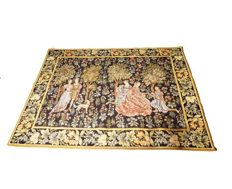 A Point de L'Halluin tapestry depicting a Medieval "Scene Gallant", with young noblemen and women set over a mille-fleurs gro