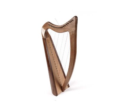 A modern 19 string knee harp, constructed of teak and other woods, 72cms high.